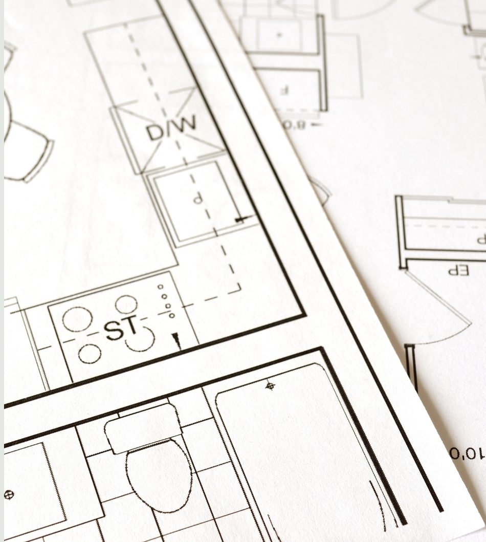 Architectural floor plan blueprints with kitchen and bathroom layouts